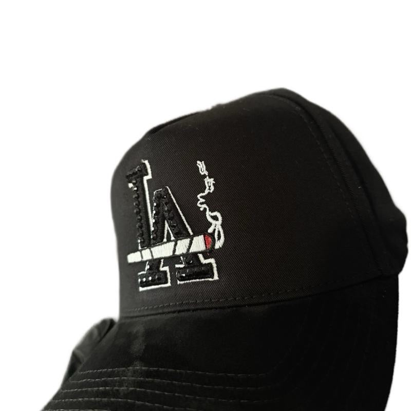 GORRA DEL LA. ENCENDEDOR